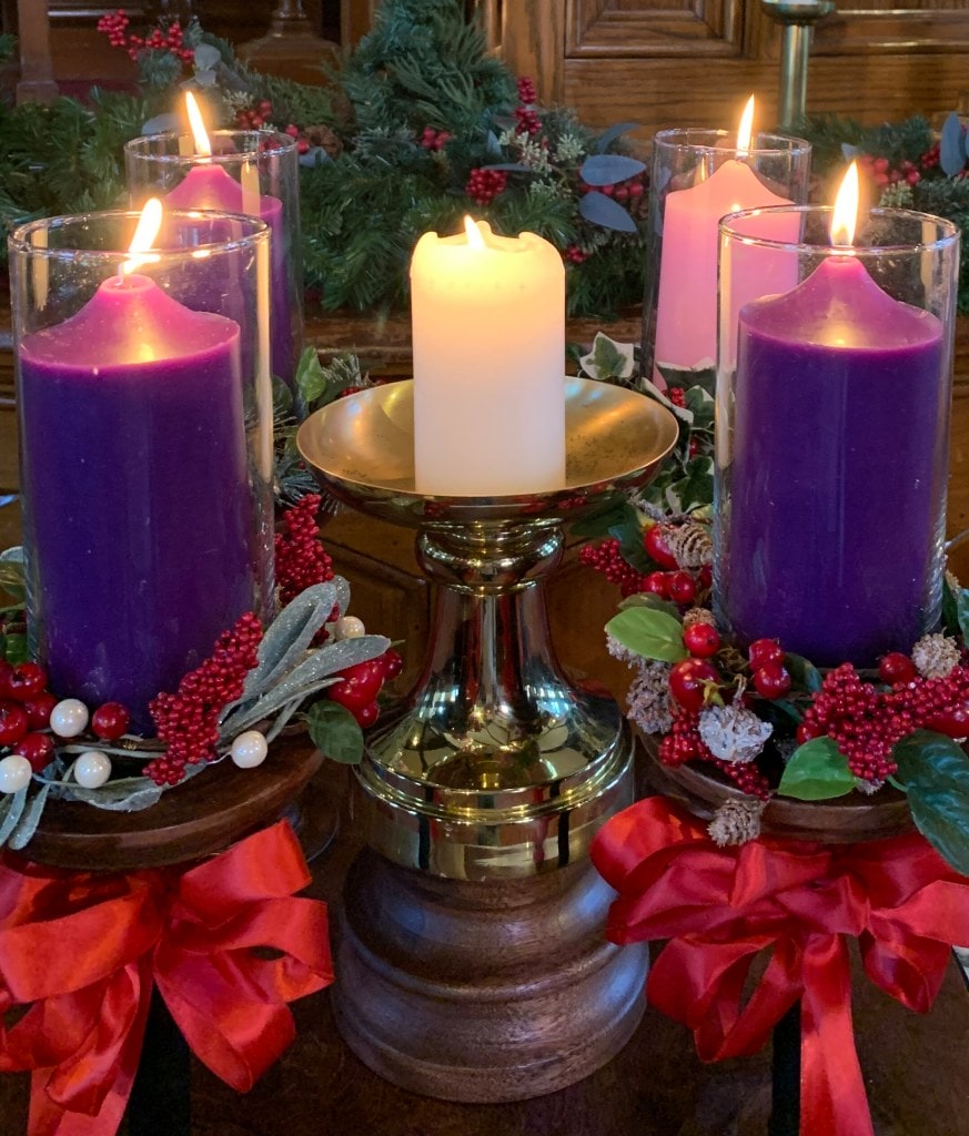 5 advent candles, 3 purple, 1 pink, and 1 white