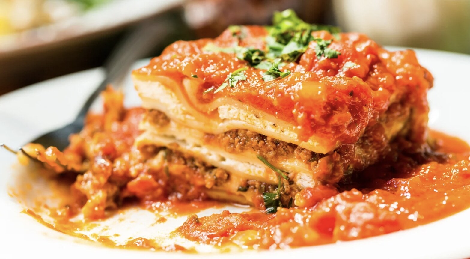 screenshot lasagna and fork on a plate