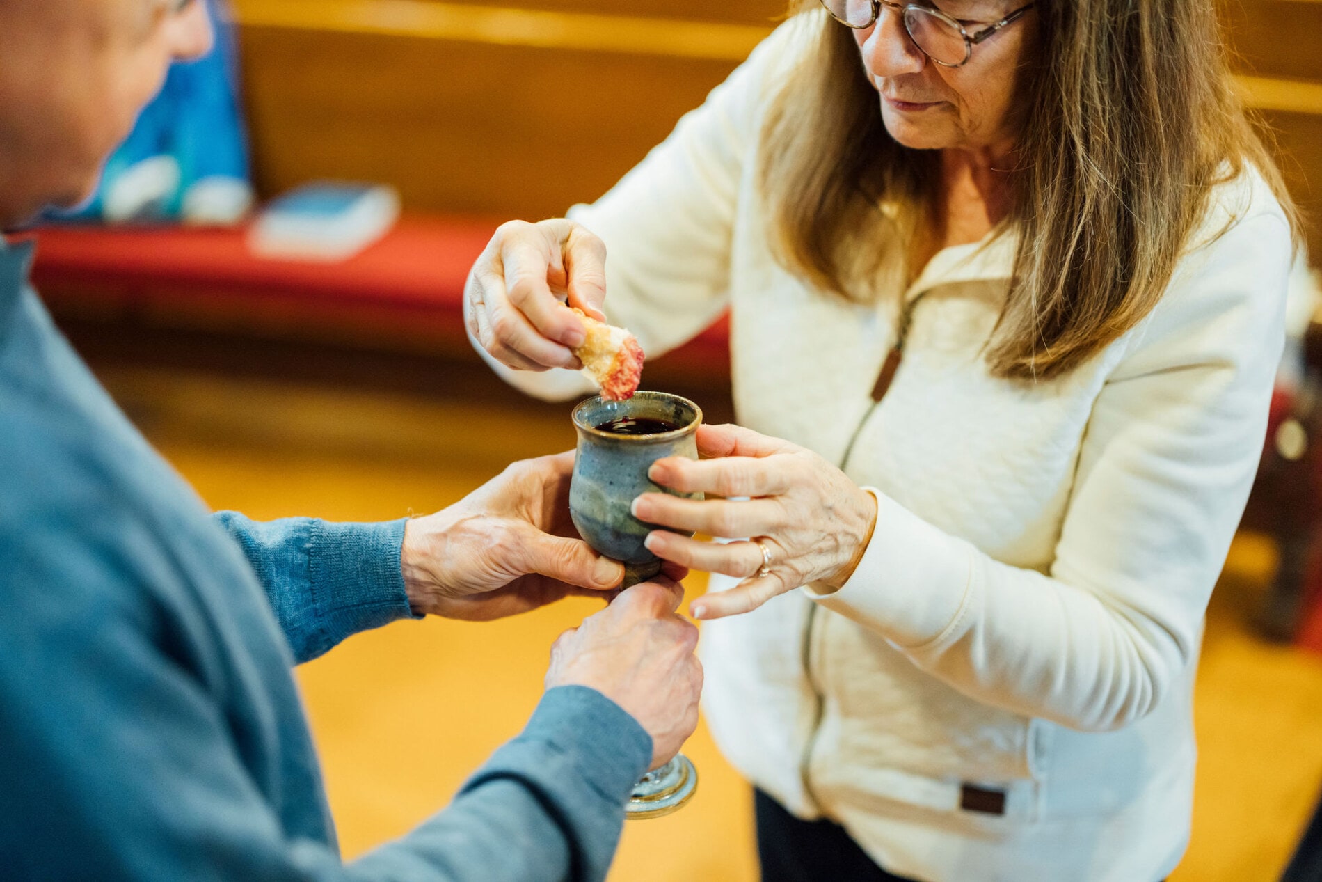 A congregant receives communion