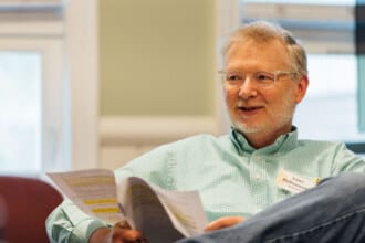 A man speaking during a Bible study
