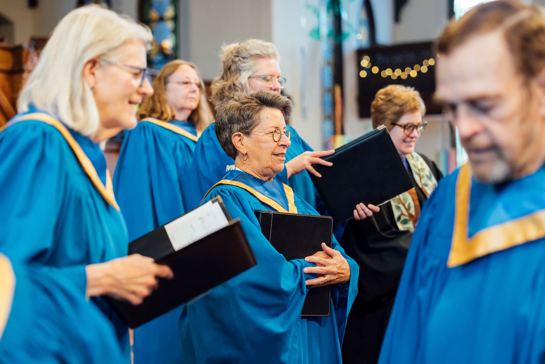 Choir members in blue robes
