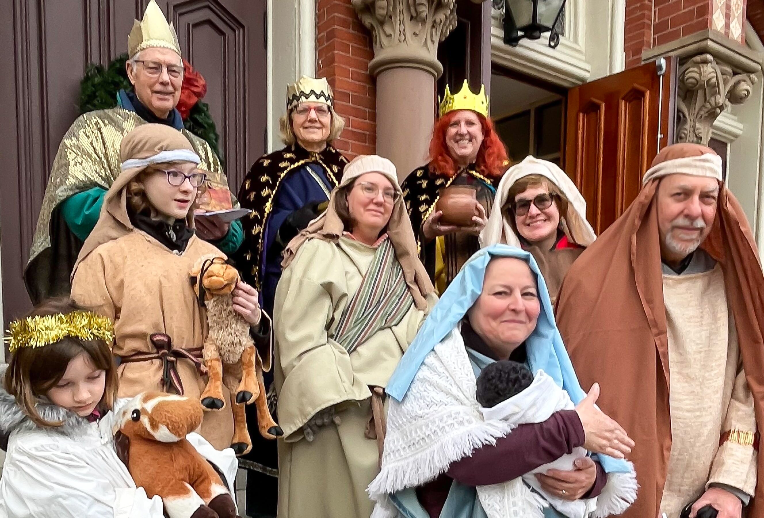 Living Creche 2023a Carolers dressed up as a Living Creche manger