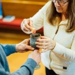 Woman receiving communion