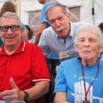 Three friends at the church barbeque.
