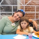 Mother and daughter at the church barbeque.