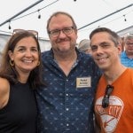 Three friends at the church barbeque.